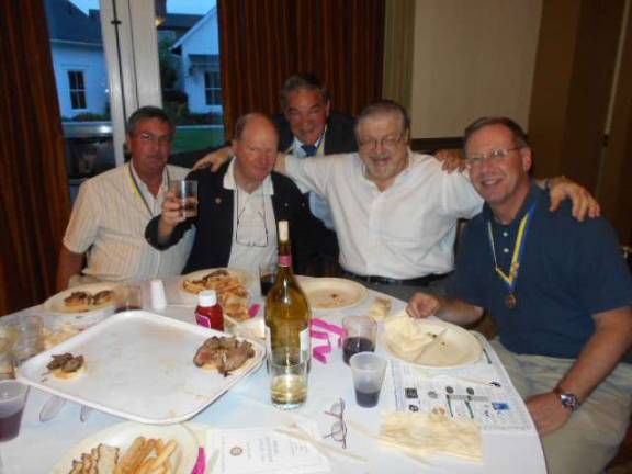 Leo Kaytes, Jr. heads Warwick Rotary Club Five past presidents of the Warwick Valley Rotary Club toast their new leader. Left to right are John Bollenbach, Ed Wiley, Stan Martin, Ed Maddalena and Neil Sinclair.