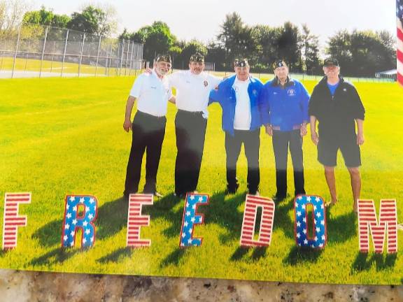 Warwick military veterans Jose Morales, Carmine Garritano, Stan Martin, Warren McFarland and Tom Brennan will participate in the June 14 Flag Retirement Ceremony open to the public at the Warwick American Legion Building. They are shown during the COVID-delayed Warwick Middle School’s Valentines for Veterans event held May 25.