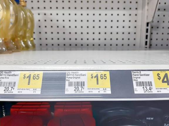 Empty shelves where hand sanitizer once stood.