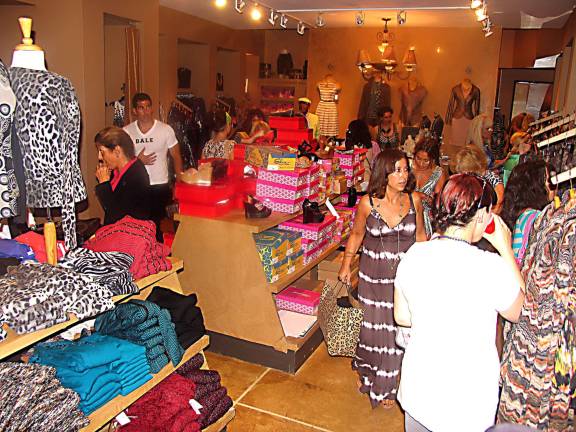 Sixteenth annual Ladies Night Out held Thursday evening August 22 Photo by Roger Gavan Customers in Style Council.