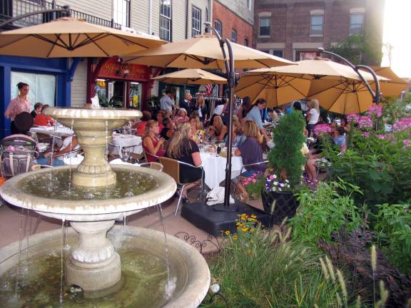 A night for the ladies File photo by Roger Gavan Many visitors enjoyed relaxing at one of the attractive outdoor cafes in the village during last year's Ladies Night Out.