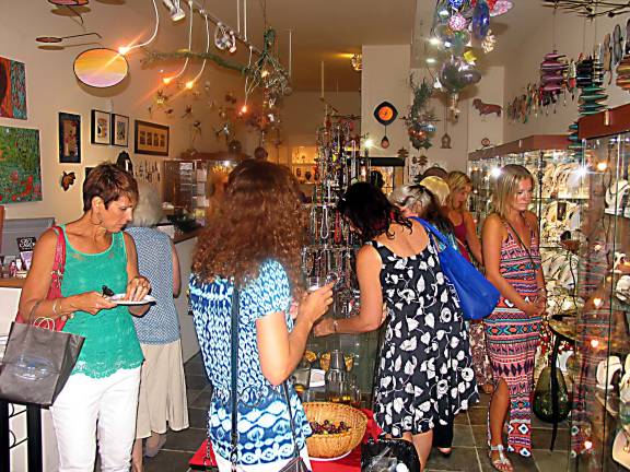 Sixteenth annual Ladies Night Out held Thursday evening August 22 Additional photos can be found online at warwickadvertiser.com Shoppers at Iriniri gift shop.