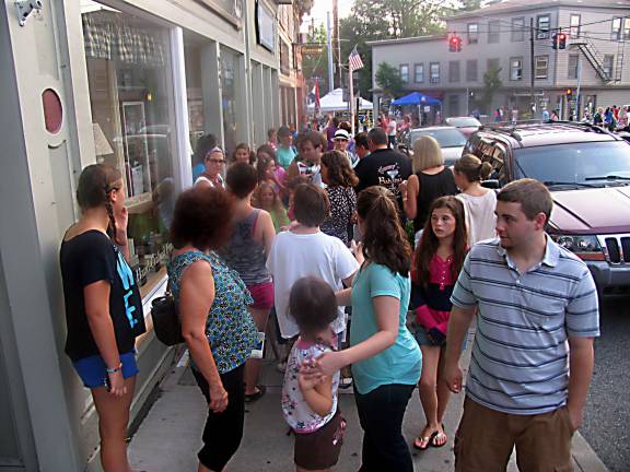 Sixteenth annual Ladies Night Out held Thursday evening August 22 The Downtown Warwick Merchants' 16th anniversary of the traditional celebration of "Ladies Night Out" and "Queen for a Day" was bigger than ever and buzzing with excitement and activity on Thursday evening, Aug. 22.