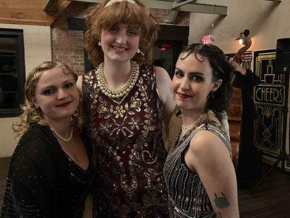 L-R: Holly LaRose, Shelby Murawinski, and Amy Sherman dressed in 1920s garb.