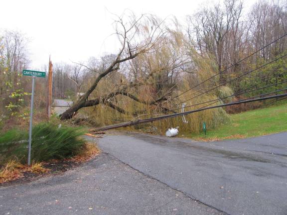 Hurrican Sandy rips through Orange County Utility poles down on Upper Wisner Road in Warwick.