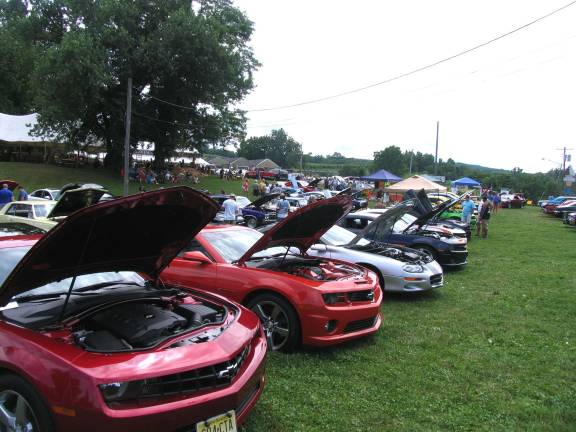 Eighth-annual Richard Jacob Rudy Memorial Car Show held at Pennings Farm Market View of RJR Memorial Fund car show at Pennings Farm Market.