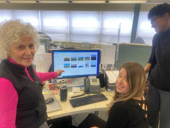 Contest judges choosing their picks. Left to right: Jeanne Straus, Publisher of Straus News; Christina Scotti, Director of Design; Felicia Hodges, Managing Editor of <i>The Warwick Advertiser</i>.)