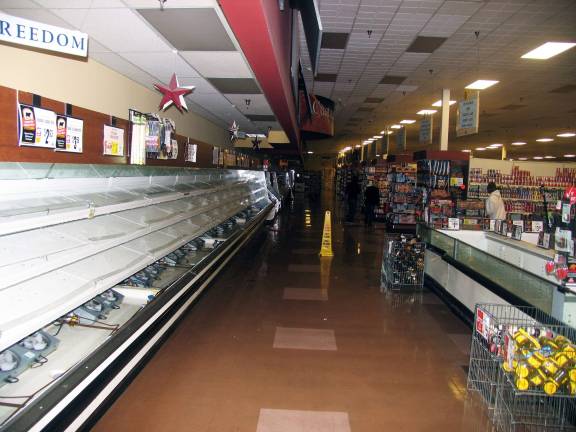 In Sandy’s wake Photo by Roger Gavan Some stores like Warwick's ShopRite had limited operation using generators but the auxiliary power was not enough to keep the meat and fish shelves stocked.