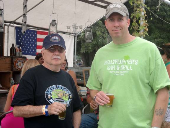 Pennings’ Brew Fest grows in its second year Nick Reynolds and Pat Donovan, both of Warwick, enjoying a sample at Pennings' Brew Fest.