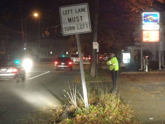 Fuel station outages cause panic Lt. Tom Maslanka of the Warwick Police Department directing traffic and making sure no one sneaks into the gas lines from the wrong direction.