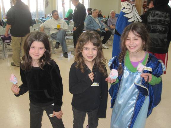 Dress up, step out for Purim Riley Morse, Beverly Nathan, and Angela Racanelli of Chester at last year's Purim party sponsored by Rabbi Borenstein's Chabad.