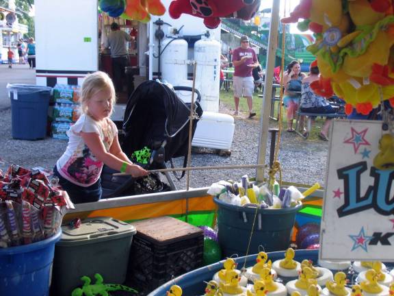Let the summer begin Fishing for a duck and a prize - Ava Harm, 4.