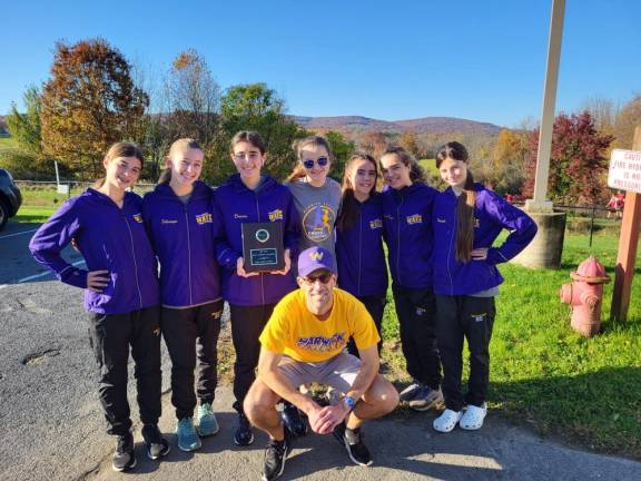 The girls cross country team before the county championship.