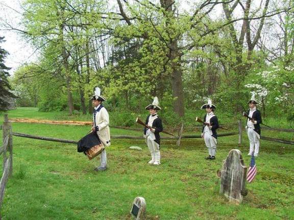 Honor our nation's soldiers at the New Windsor Cantonment With muffled drum draped in black silk for mourning, Musician Matt Thorenz from Washingtonville leads the procession of soldiers Kieran O’Keefe from Montgomery, Andrew Gillespie from Middletown and Chad Johnson from New Windsor to the New Windsor Cantonment cemetery to perform a solemn graveside ceremony to honor fallen comrades.