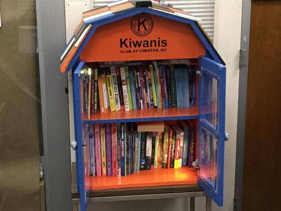 Kiwanis installs children's book box at village hall