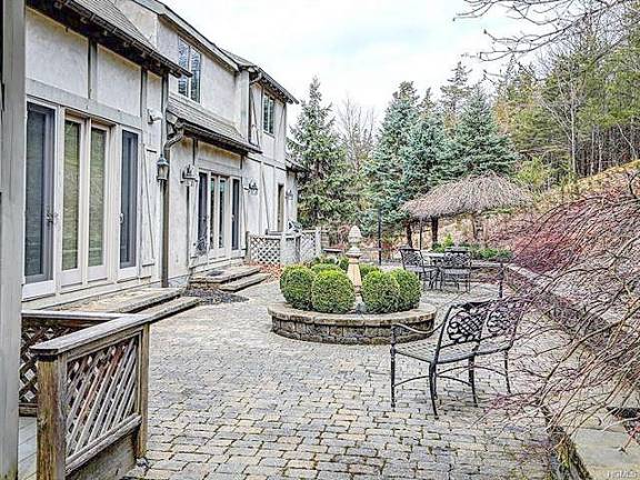 This chalet-like home is very private and, indeed, very French influenced This chalet-like home is very private and, indeed, very French influenced