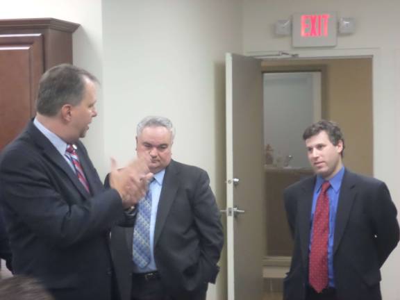 Public rails against forfeiture Photo by Nathan Mayberg Orange County District Attorney David Hoovler (left) gestures to asset forfeiture law opponent Neil Meyer (right), of Wallkill, during a hearing on the proposed law in the conference room of County Executive Steve Neuhaus in Goshen on Monday.