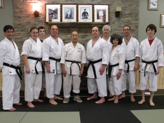 Local black belts train with world-renowned karate teacher From left: Steve Washio, Noelle Giammarino, Travis Silbernagel, Larry Schott, Teruo Chinen, Glenn Finke, Chris Silbernagel, Suzy Puma-Stehlik, Brad Davidson and Jared Silbernagel.