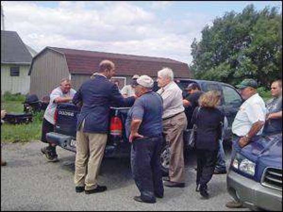 Farmers take Hall out to the barn Farmers take Hall out to the barn