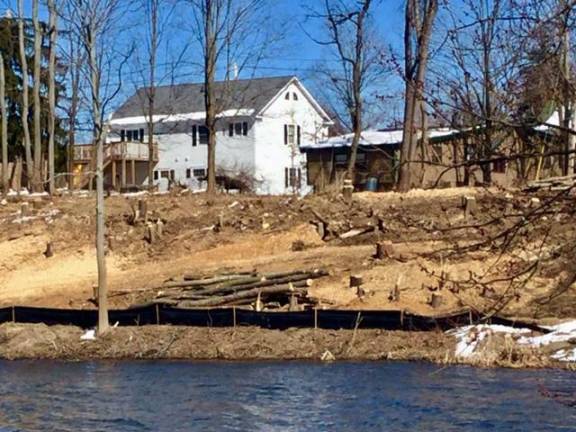 Angry over eyesore distillery developing at Creamery Pond