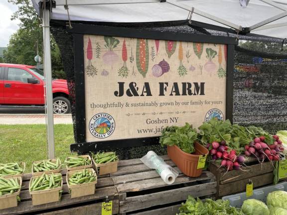 J&amp;A Farms is one of the vendors at Lakeside Farmers Market that accepts “Market Buck,” a $5 supplemental certificate that enables the recipient to redeem it for $5 worth of fresh and/or prepared foods. Photos by Peter Lyons Hall.