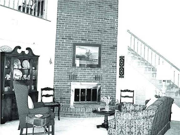 Homestead Village condominium has three bedrooms, cathedral ceiling and brick fireplace Homestead Village condominium has three bedrooms, cathedral ceiling and brick fireplace