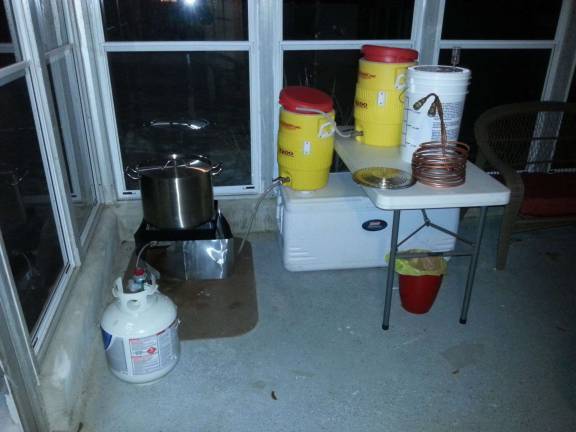 Microbrewery opens up in Lafayette Photo provided The Hassing's homebrew setup. Propane turkey fryer burner with a homemade heat shield, a 10 gallon stainless steel pot for a kettle, a couple converted coolers to hold hot water and for a mash tun, a fermenter with air lock, a copper pipe wort chiller, and a frying pan sceen used to spare (drip hot water on the mashed grains to get all the wort washed of the grains).