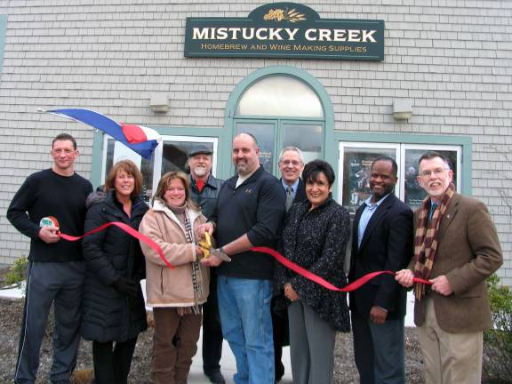 Mistucky Creek Homebrew and Wine Making Supplies hosts grand opening Photo by Roger Gavan On Feb. 21, public officials and representatives from Warwickís business community joined owners Lloyd and Janet VanDuzer and a couple of home brewers for the official grand opening of Mistucky Creek. Front, from left: Home brewer Paul Sanok, Warwick Valley Chamber of Commerce Secretary Mechelle Casciotta, owners Janet and Lloyd VanDuzer, Chamber Vice President Sherry Bukovcan, President Cedric Glasper and Town of Warwick Supervisor Michael Sweeton; and rear, from left: Home brewer Dr. Robert Kramer and Chamber Executive Director Michael Johndrow.