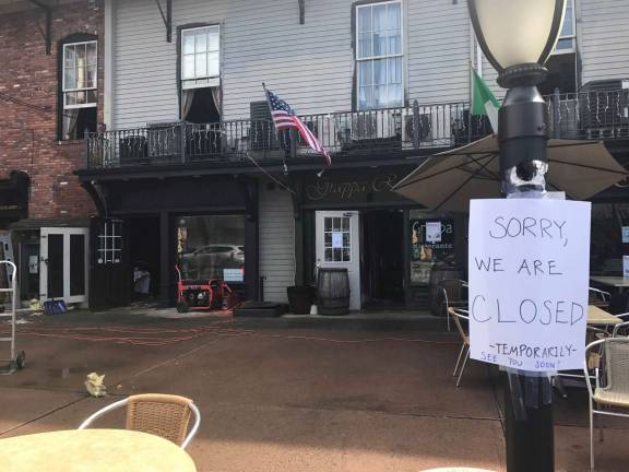 Photo by Erika Norton Building owner Tony Sylaj said he was disappointed that Grappa Ristorante will likely be closed for the Easter holiday. There were 200 reservations of more than 300 people expected this weekend.