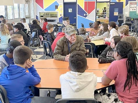 Veterans commune with Gold Hill Elementary kids at a breakfast