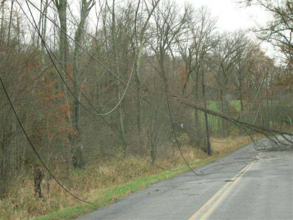 O&R: Generators complicate work Wires brought down by a fallen tree on Knoell Road in the Town of Goshen. The wires were laying along the road for nearly a mile stretch. (Photo by Geri Corey)