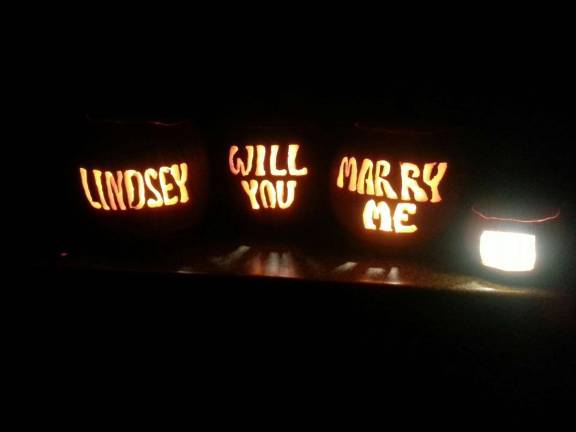 Carving it up Lindsey Russell David Drew of Warwick, N.Y. She received a very cute and creative fall proposal. And she said, Yes!