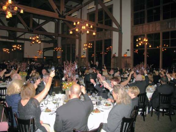 Seventy-five years in the making On Saturday evening, Nov. 8, the Warwick Valley Chamber of Commerce celebrated its 75th Anniversary Membership Dinner at the Red Tail Lodge at Mountain Creek in Vernon, N.J. The 184 guests raise their glasses in a toast proposed by Executive Director Michael Johndrow.