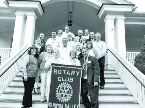 Leo Kaytes, Jr. heads Warwick Rotary Club Warwick recipients of the prestigious Paul Harris medallion, named for the founder of Rotary International, include, left to right, front row, Lisette Cuba, Sally Wiley, Jane Wiley, Stella Kosior and Stan Martin; second row, Emily Wiley, John Bollenbach, Virginia Mazza Loomis and Mechelle Casciotta; back rows, Neil Sinclair, Shawn Ryan, Roger Gibboni, Dr. Calvin Hargis, Dr. Ray Bryant, John Buckley, Joe Baltes, Dr. Ed Wiley, Leo Kaytes, Sr., and Leo Kaytes, Jr.
