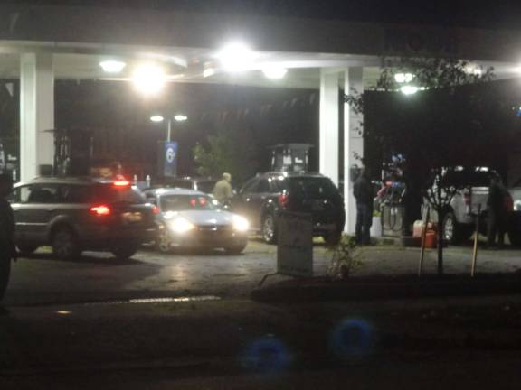 Fuel station outages cause panic Vehicles jockeyed for position on chaotic lines for fuel at the Mobil station.