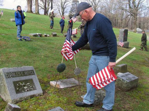1,600 flags On Saturday, April 26, veterans, like Barry O'Neil, and volunteers from Boy Scout Troop 45 completed the placing of over 1600 flags at the local gravesites of veterans throughout the area.The task in Warwick and St. StephenþÄôs Cemeteries, along with many smaller and private cemeteries within the Town of Warwick, was in preparation for upcoming Memorial Day ceremonies on May 26.
