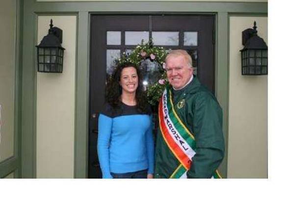 St. Pat's gets February kick-off Photo provided Grand Marshal Bill Boss with Kelley English in front of Kelley Jean's Restaurant in Goshen.