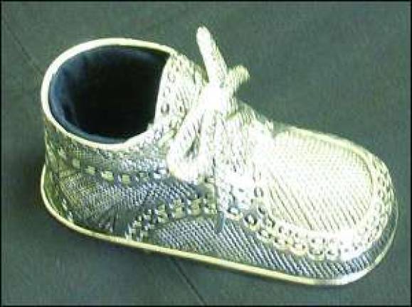 Etched In Time donates keepsake baby shoes' for newborns at birthing center Etched In Time donates keepsake baby shoes' for newborns at birthing center