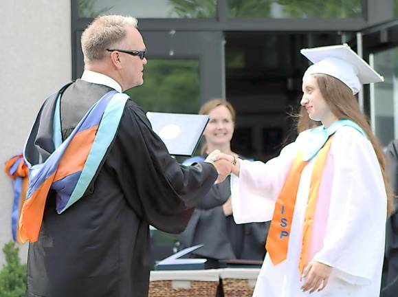 The graduation of the Class of 2021 also was a milestone for Michael Rheaume – it was his final day as principal of Seward.