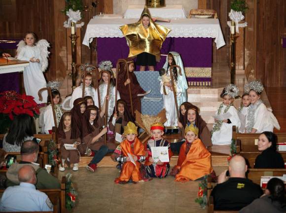 Twice blessed The second Christmas Pageant at Holy Rosary Church in Greenwood Lake took place on Wednesday, Dec. 21: Pictured above are Maya Gilson as the main star, Evin Hernandez as Joseph, Audri Ruiz as Mary, Payton Oser as the main angel, Briana Rose, Angie Foschini, Bailie Frey, Danica Eisenring, Emma Dwyer and Caroline Rourke as angels, Kristina Montalto, Natalie McAteer-Purdy, Ava Piccirillo, Tamryn Fiasconaro, Brooke Ackerman and Talia Sauro as shepherds, Joseph Rourke as innkeeper/shepherd, Aiden Morrow, Joseph Kerr and Dane Hirrel as wisemen.