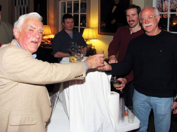 A night out at the tavern nets $4,000 for the Warwick Historical Society New Milford Artist Robert Fletcher accepts a glass of home brew offered by David Sherfey, president elect of the Historical Society of the Town of Warwick.