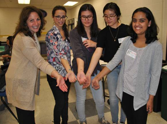 Club members raise $1,300 to fight local hunger with 'Empty Bowls' event Showing off their Empty Bowls temporary tattoos are WVHS Empty Bowls Club advisors, teachers Shari Blauner and Gina Buffardi, with club members.