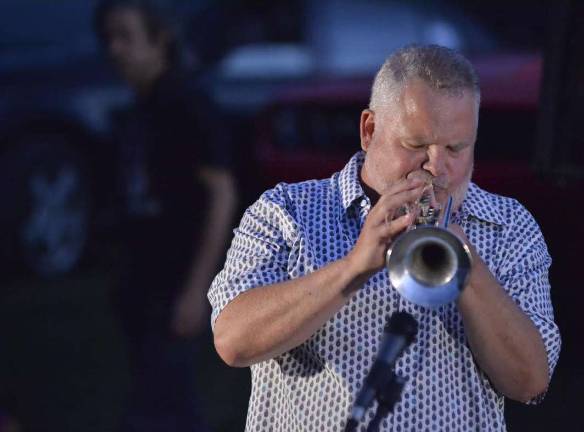 Richard Kimball and Rick Savage perform 'Music For Humanity concert on Oct. 28 Rick Savage on trumpet.