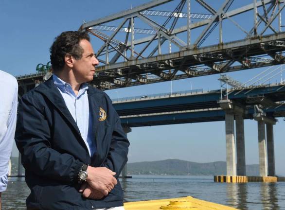 What’s in a name? Gov. Cuomo is pictured looking at the side-by-side old and new spans of the Tappan Zee (Photo: NYS Thruway Authority)