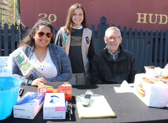 Warwick's expanded Operation Clean Sweep 2018 credited as successful Photos by Roger Gavan After six years, Julia Vargas (left), who is heading off to college, is turning over the Operation Clean Sweep responsibility to Elizabeth Verboys (center), a member of Girl Scout Troop 733. Warwick Valley Chamber of Commerce Ececutive Director Michael Johndrow (right) praised Vargas for her many years of dedication and he thanked Verboys for accepting the challenge.