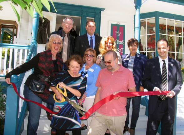 My Sister’s Closet turns 40 Photo by Roger Gava On Sept.r 24, a representative of Assemblywoman Annie Rabbitt, Chester Supervisor Steve Neuhaus and members of the Sugar Loaf and Warwick Valley Chambers of Commerce joined owner Beth Duke and her husband, Don, for a celebration and ribbon cutting. Front: From left, Sugar Loaf Chamber of Commerce representative Rachel Bertoni, owner Beth Duke and her husband, Don and Warwick Valley Chamber of Commerce President Paul Rafanello.Center: From left, New York State Assemblywoman Annie Rabbitt Chief of Staff Marie Streets, Warwick Valley Chamber of Commerce Board member Karen Burke and Vice President Sherry Bukovcan. Rear: Warwick Valley Chamber of Commerce Executive Director Michael Johndrow and Town of Chester Supervisor Steve Neuhaus.
