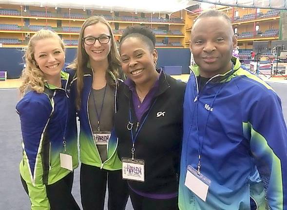 Florida. Orange County Sports Club Coach AlanHatch recognized at Wendy Hillard's gymnastics competition Pictured from left to right are coaches Jacqueline Combs, Bella Volker, Wendy Hilliard and Alan Hatch.