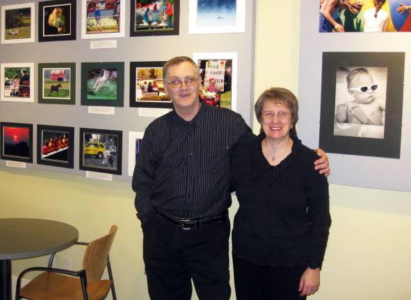 Photographer donates exhibit panels to library Robert and Joan Demetry stand in front of exhibit panels, which they donated to Albert Wisner Public Library following the close of his recent photography exhibit celebrating a half century behind the cameraís lens.