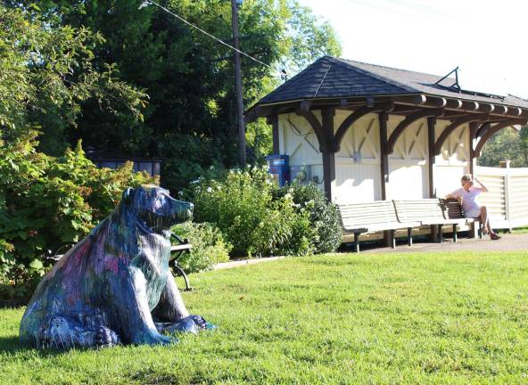 Cosmo the bear has landed Photos provided by the Village of Warwick Visitors are encouraged to interact with and photograph the sculpture, which will be on Railroad Green in the Village of Warwick now through November.