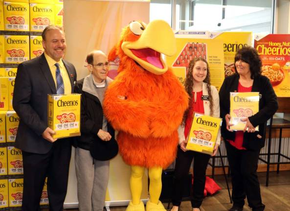 ShopRite hosts unveiling Cheerios box ceremony for fight hunger project From left, Store Manager Charles Sladek, Glenn Dickes, director of the Warwick Ecumenical Food Pantry, Sonny the Bird from General Mills and employees Kayla Frisenea and Linda Glasspool.